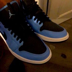 Blue and black low top jordan 1s